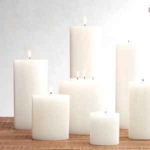 New! Pottery Barn 3”x10” unscented wax pillar candle in white